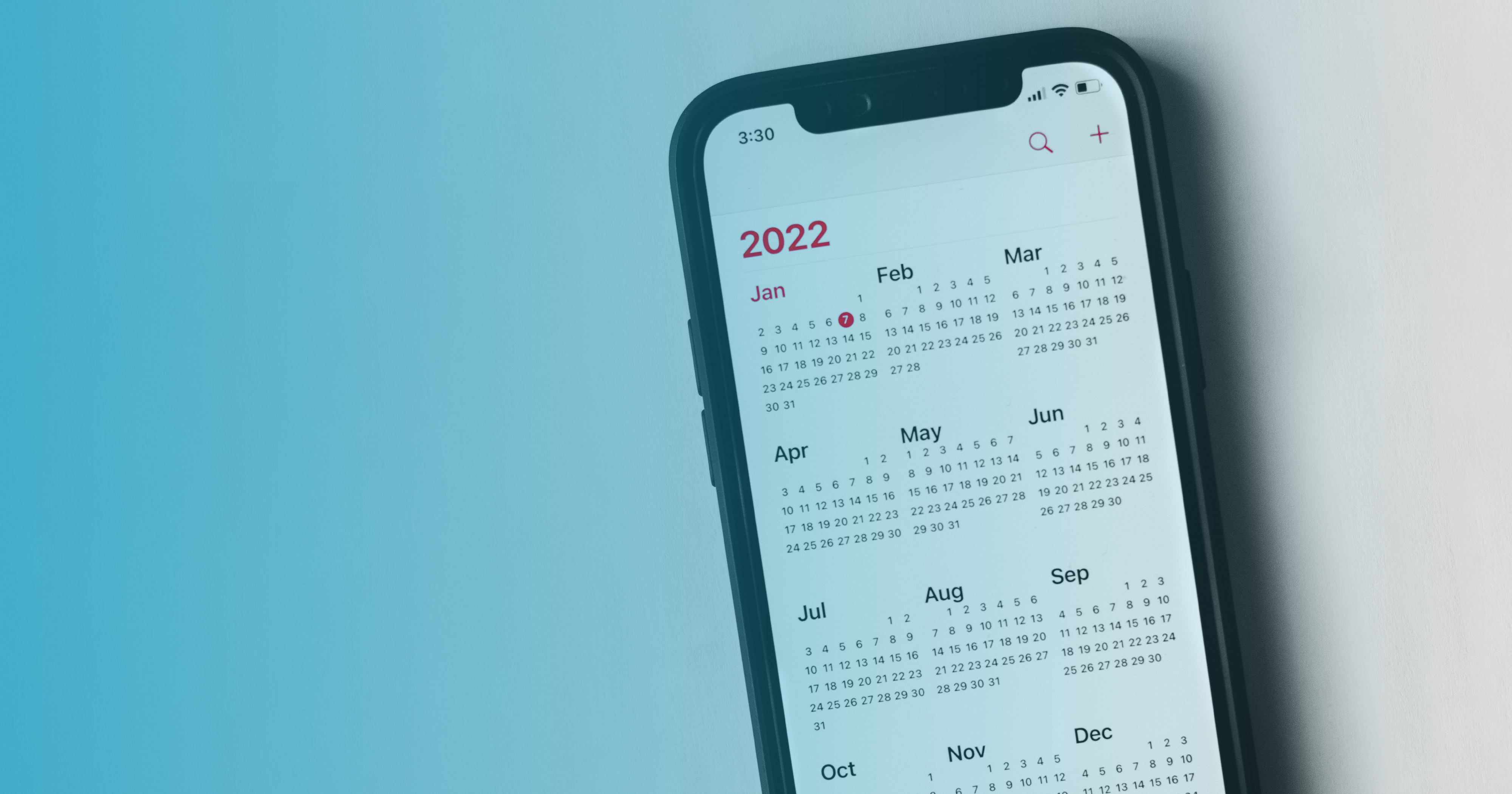 Image of a phone with a yearly calendar for 2022 on the screen 