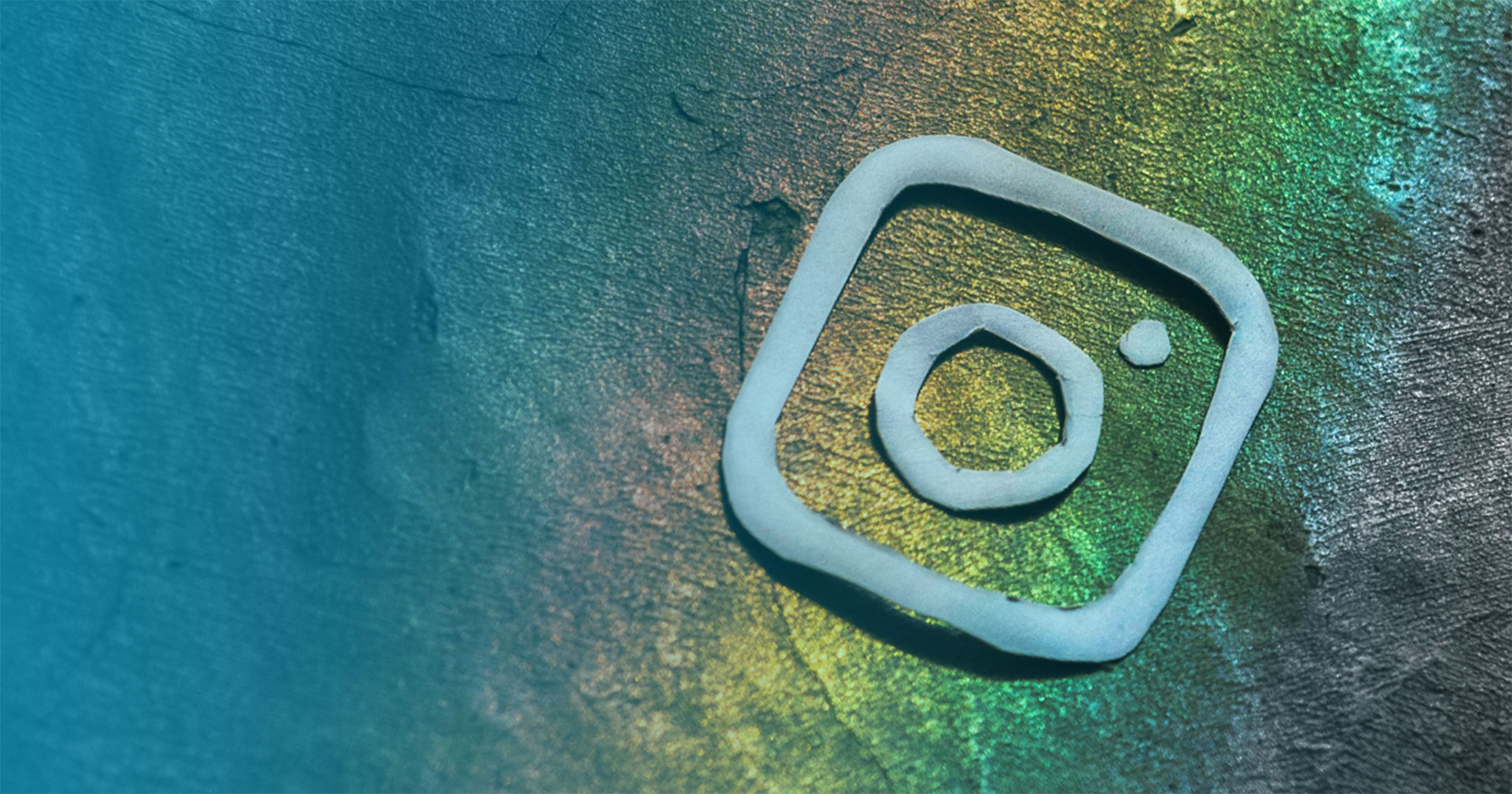 Handmade Instagram logo on a rainbow background